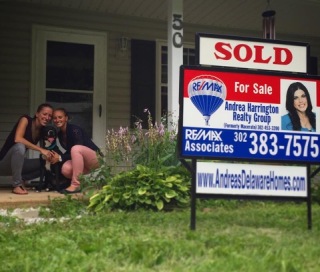 sold house couple.jpeg